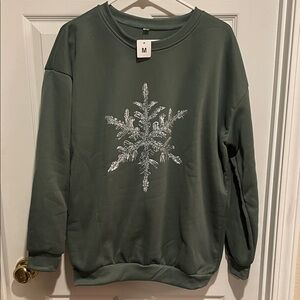 Green Sweatshirt with Snowflake Design